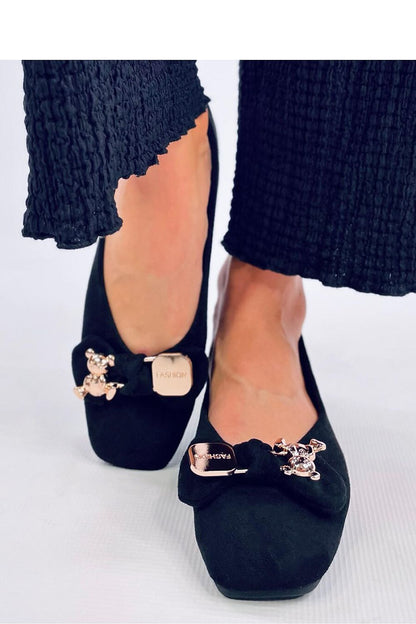 Chic Inello suede ballerinas with square toes, embellished with a gold bow and teddy bear, offering a blend of comfort and luxury for every occasion.