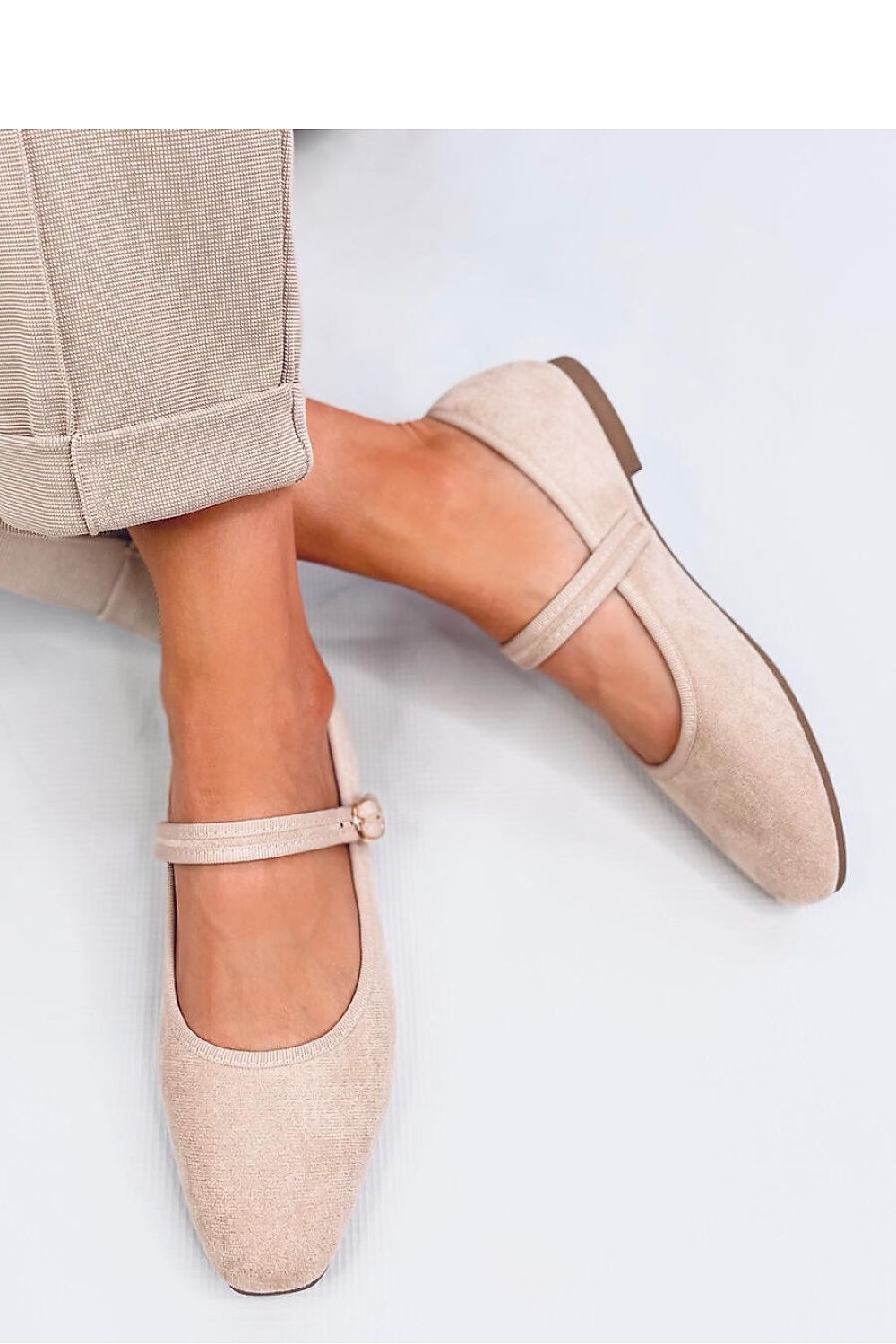 Elegant women's suede ballet flats with Mary Jane strap by Inello, showcasing luxurious eco-friendly materials and stylish design.
