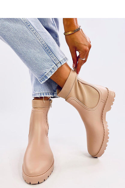 Stylish Women's Inello Rubber Wellington Boots featuring a luxurious gold zipper, perfect for rainy walks.