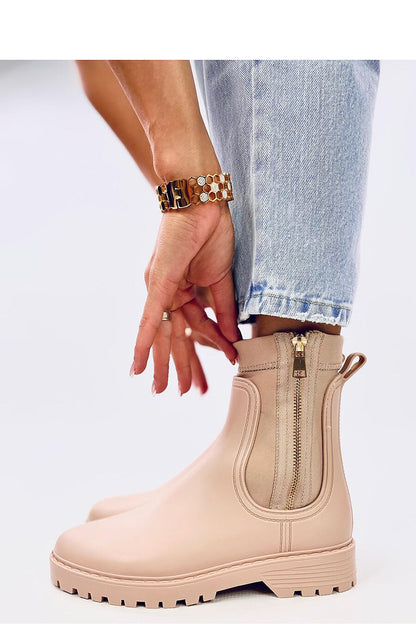 Elegant Women's Inello Rubber Wellington Boots showcasing a chic design with a gold zipper accent, ideal for fashionable rainwear.