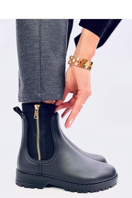 Stylish Inello rubber wellingtons for women with comfortable fit and a sophisticated gold zipper detail.