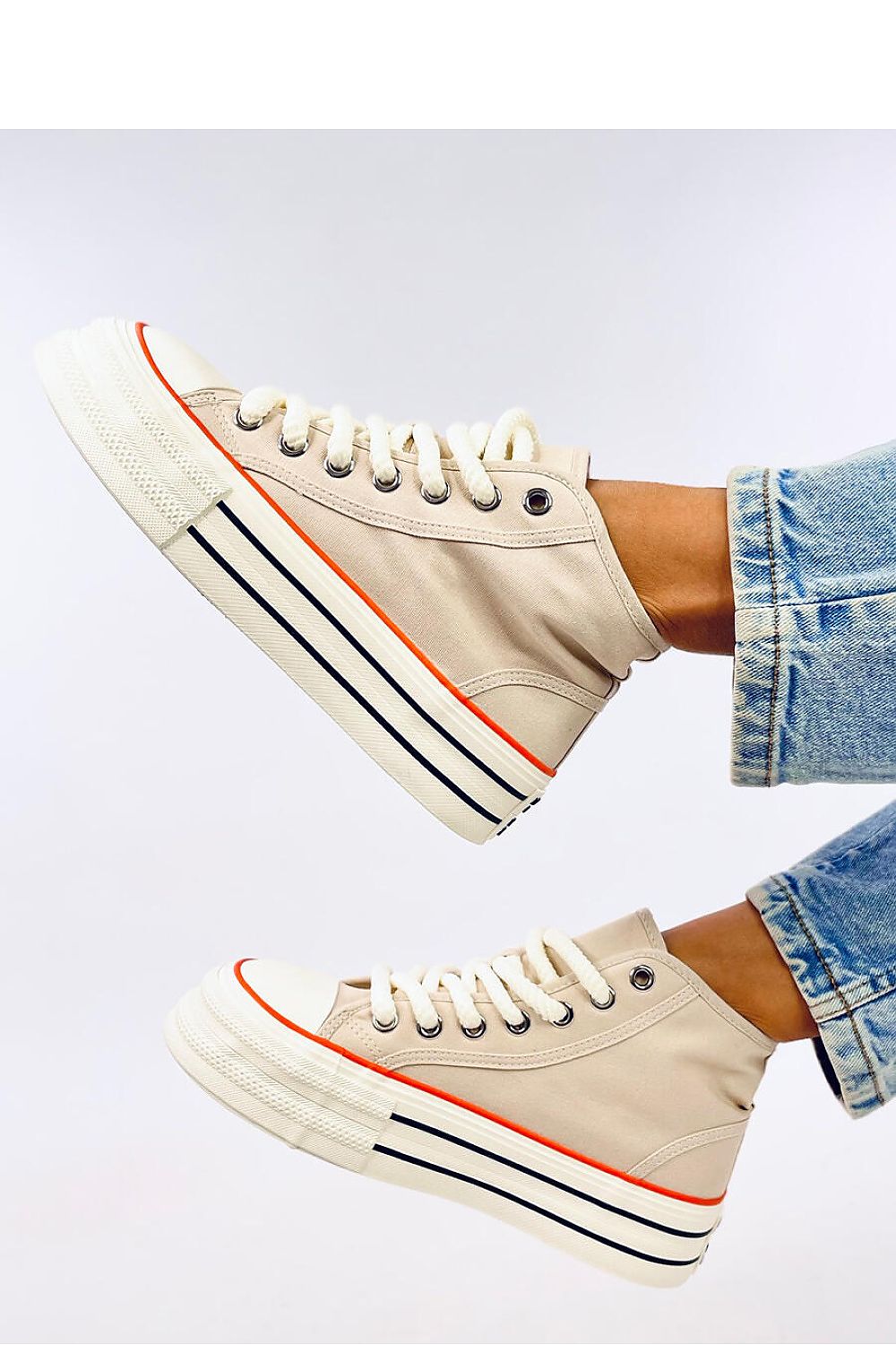 Sophisticated Women's Inello ankle sneakers on a platform, designed with thick laces and crafted from soft fabric, embodying chic comfort for modern style.