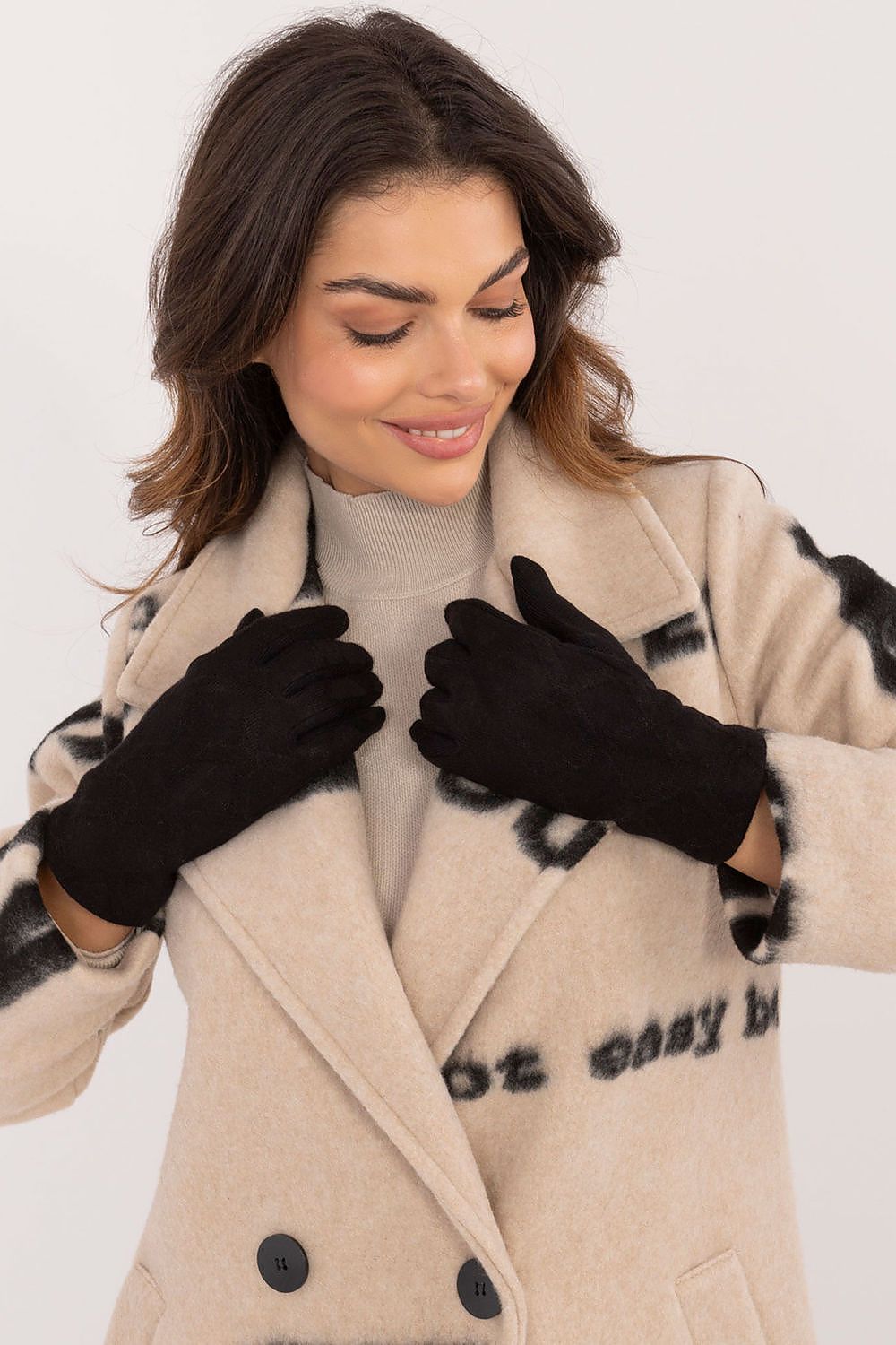 Close-up view of AT's Elegant Women's Insulated Gloves showcasing the beautiful embroidered flower detail on the index finger.
