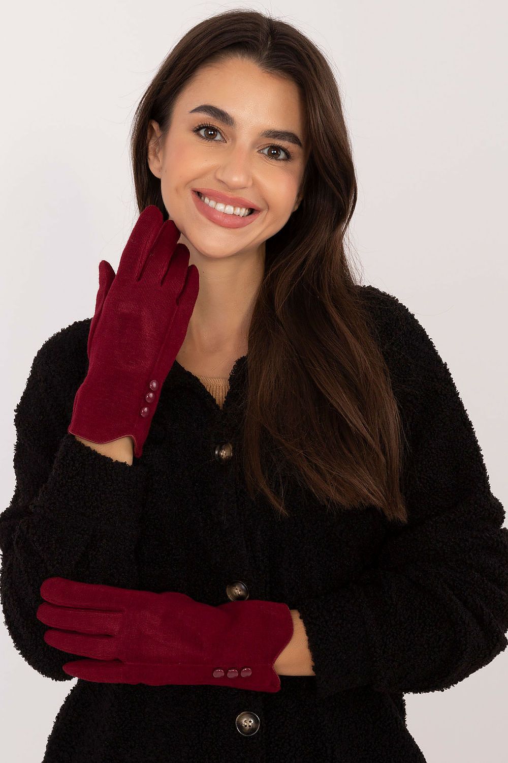 Elegant insulated women's gloves by AT featuring decorative buttons and a touchscreen index finger, perfect for luxurious winter attire.