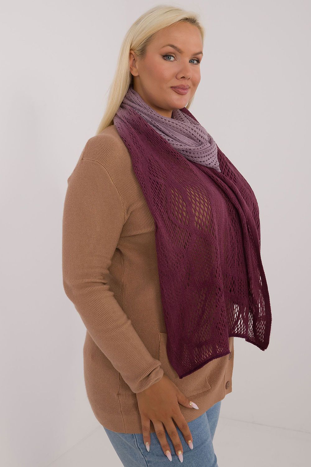 Graceful openwork scarf by AT, crafted with 80% cotton and 20% wool, showcasing an elegant design ideal for elevating autumn and winter outfits.