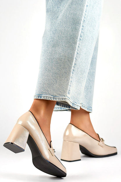 Elegant beige patent leather block heel pumps by PRIMO, showcasing a luxurious 7.5 cm stiletto heel and a classic comfort design, perfect for any occasion.