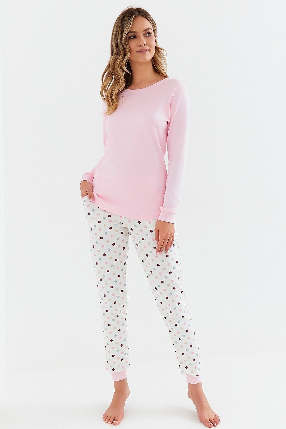 Luxurious women's interlock cotton pyjamas set by Cana featuring a long sleeve blouse with a semi-circular neckline and stylish printed pants with pockets.