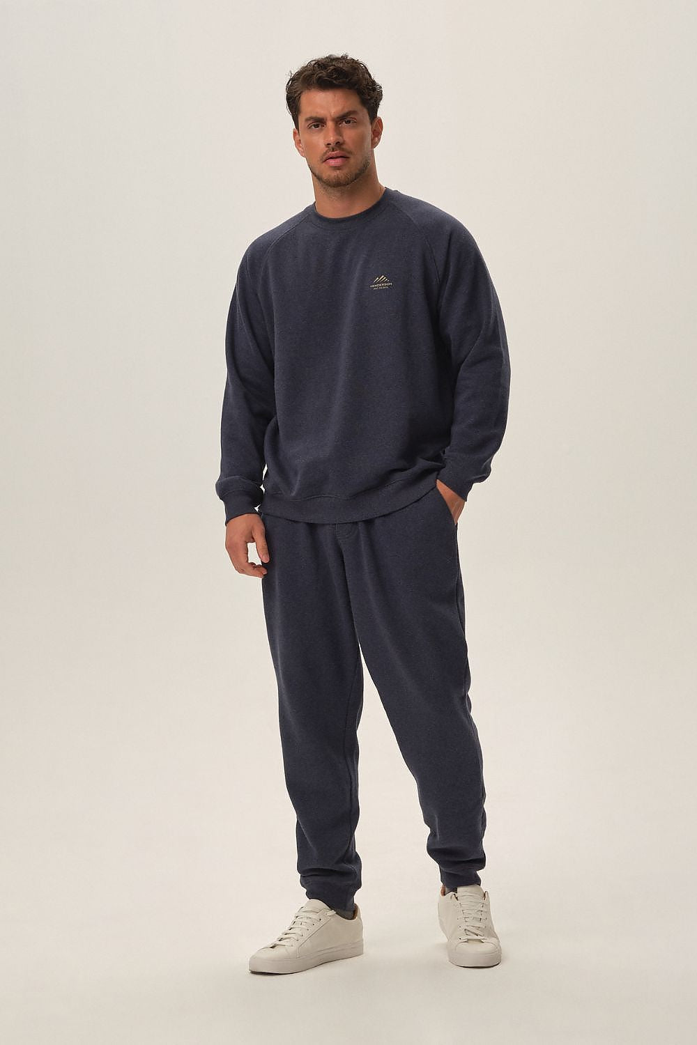 Luxurious Henderson navy blue cotton-blend tracksuit set featuring a comfort fit sweatshirt and long pants, ideal for stylish everyday wear.