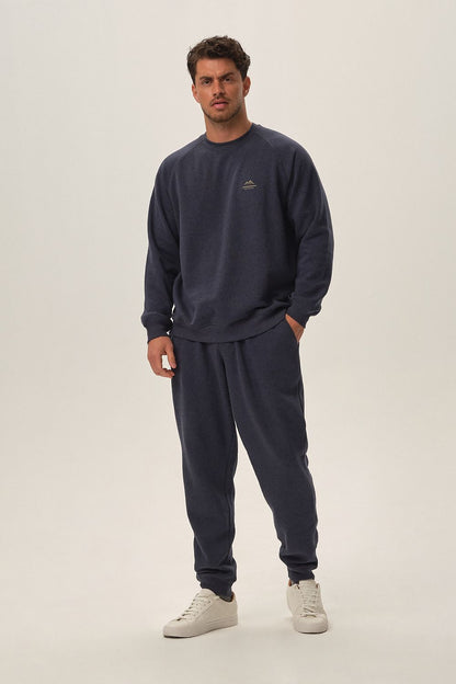 Luxurious Henderson navy blue cotton-blend tracksuit set featuring a comfort fit sweatshirt and long pants, ideal for stylish everyday wear.