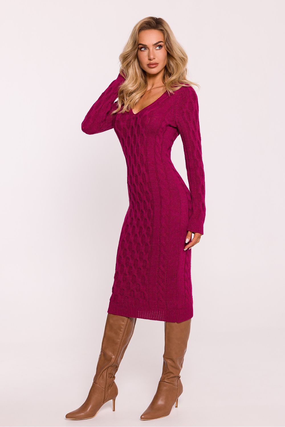 Detail view of Moe's elegant midi sweater dress showcasing its beautiful variegated weave and classy V-neckline.