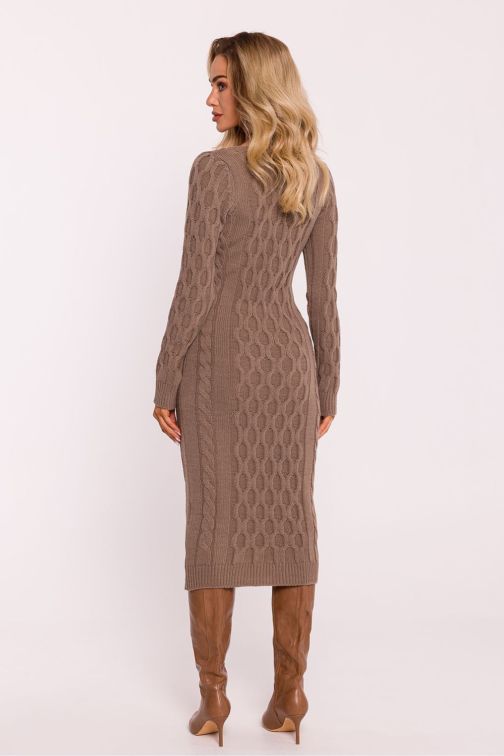 Detail of the luxurious fabric and craftsmanship in Moe's elegant midi sweater dress, emphasizing stylish comfort and quality.