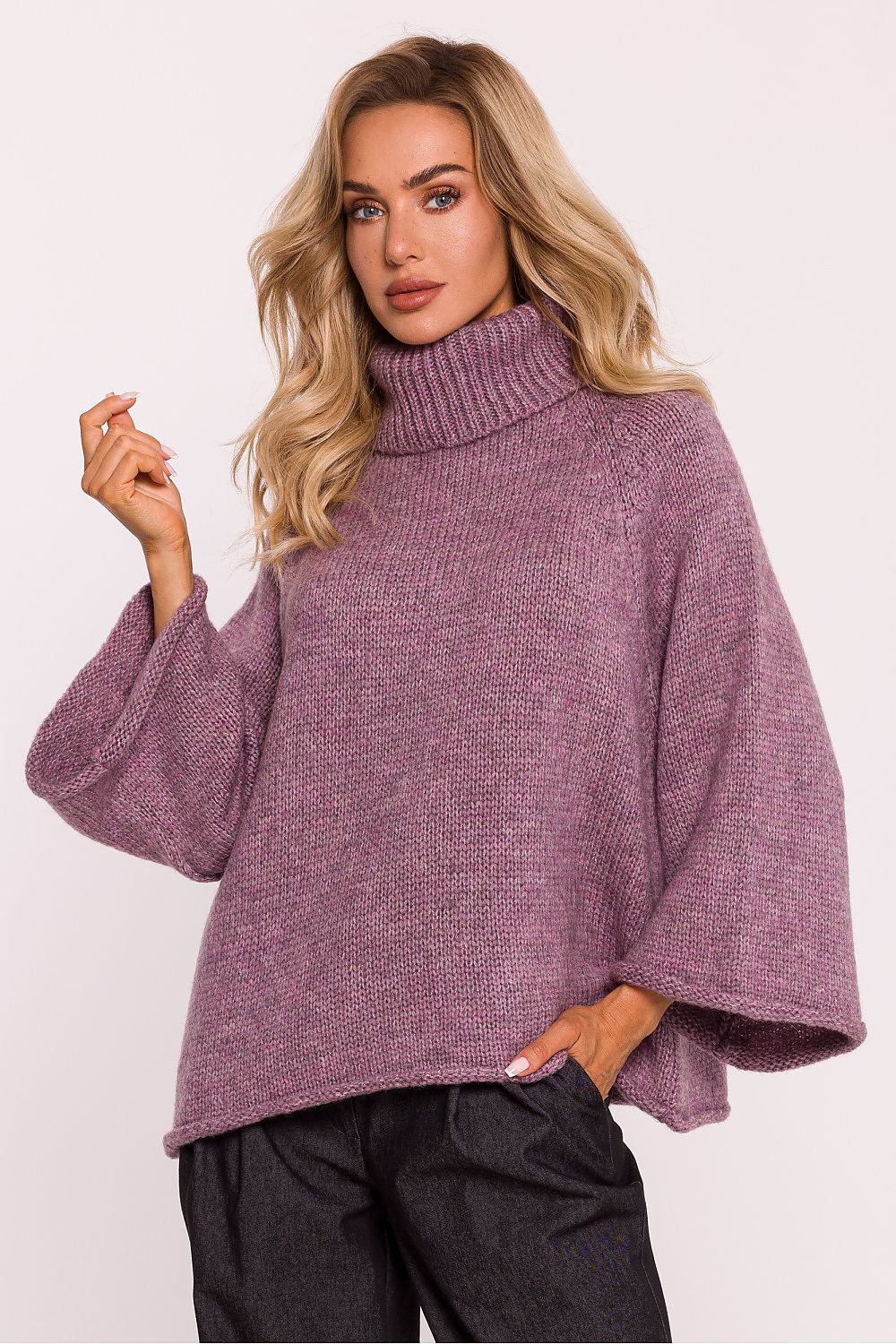 Luxurious oversized turtleneck sweater by Moe, crafted from soft pile yarn in a stylish, relaxed fit, featuring wide 7/8-length sleeves.
