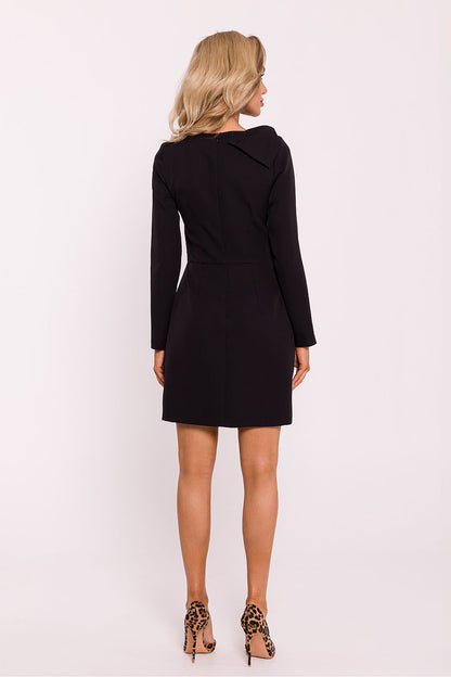 Elegant mini dress with long sleeves and front slit by Moe, showcasing its lightweight Polish design and luxurious fabric draping beautifully over the figure.