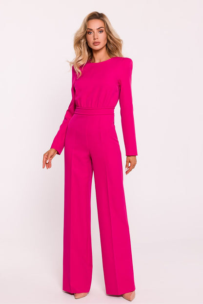 Elegant women's jumpsuit by Moe featuring padded shoulders and a chic decorative metal zipper, embodying modern luxury style.