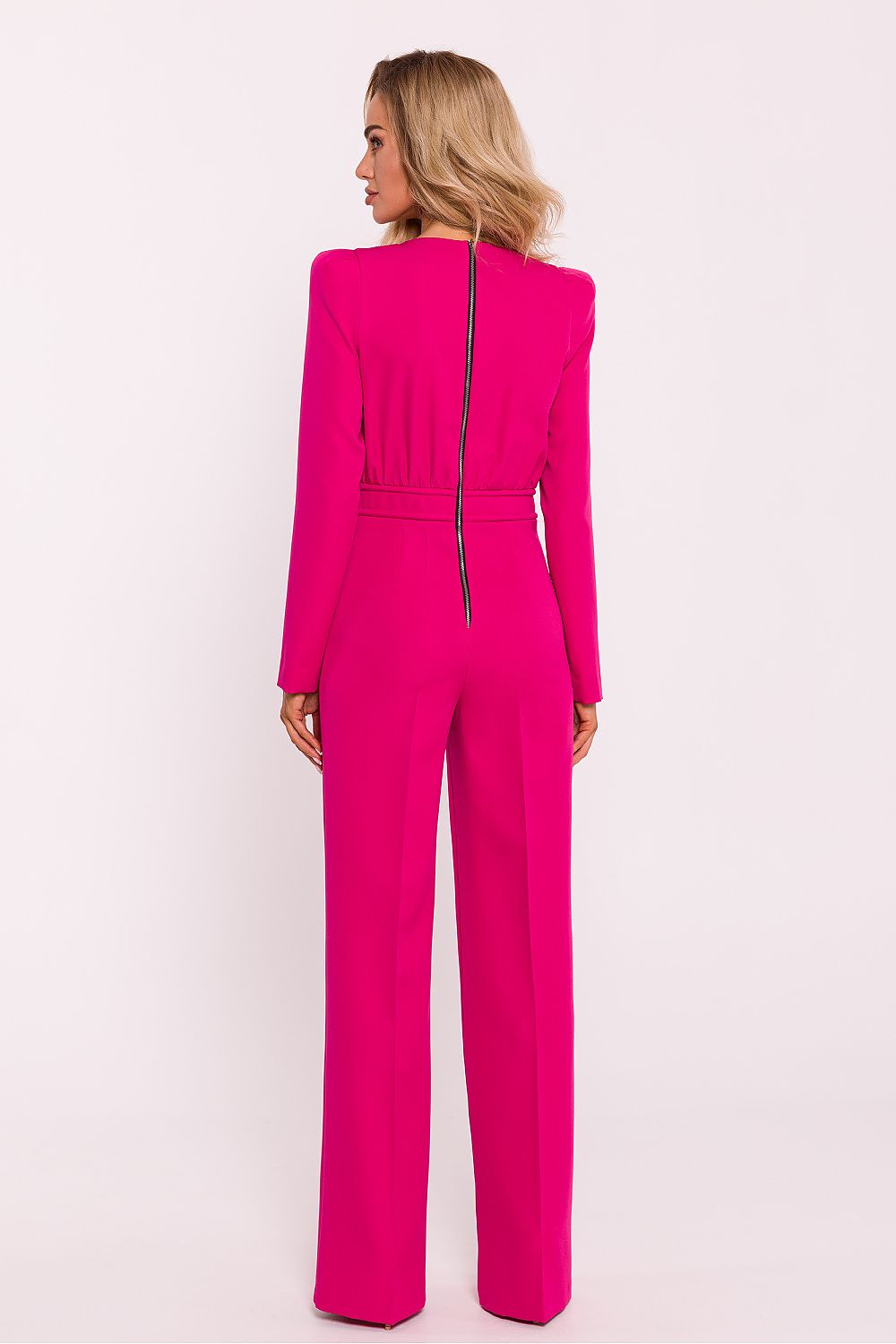 Sophisticated view of Moe's women's jumpsuit with a fitted top and wide legs, designed for a contemporary elegant look.