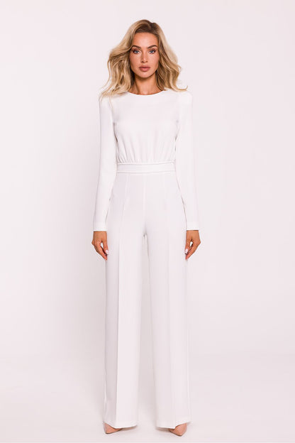 Elegant women's jumpsuit by Moe featuring padded shoulders and a decorative metal zipper, embodying modern chic style.