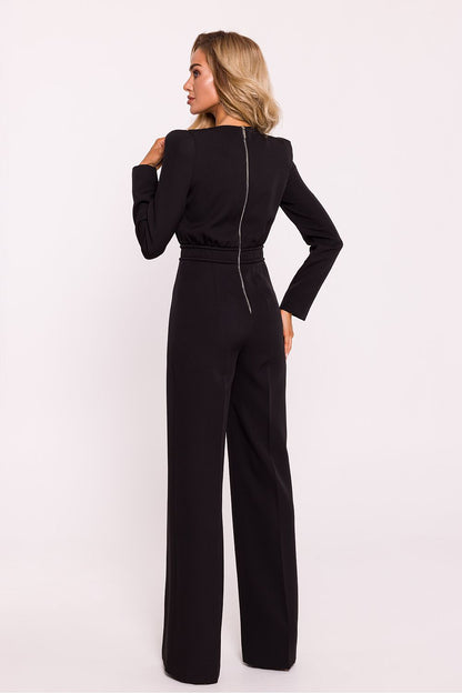 Elegant women's jumpsuit by Moe featuring padded shoulders and a decorative metal zipper, embodying modern chic style in high-quality fabric.