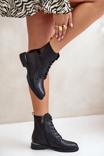 Stylish Vinceza Women's Leather Boots featuring a chic flat heel and warm shoe covers, ideal for fashionable winter wear.
