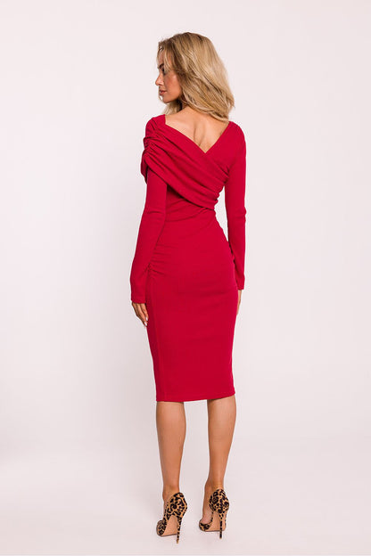 Asymmetrical neckline detail of the luxury dress by Moe, offering a modern and sophisticated look.