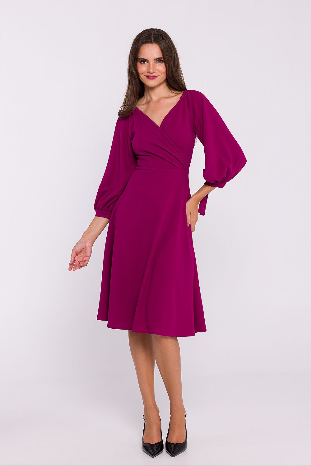 Stylove romantic knit day dress featuring a sensual V-neckline and adjustable sleeves, embodying luxury and comfort.