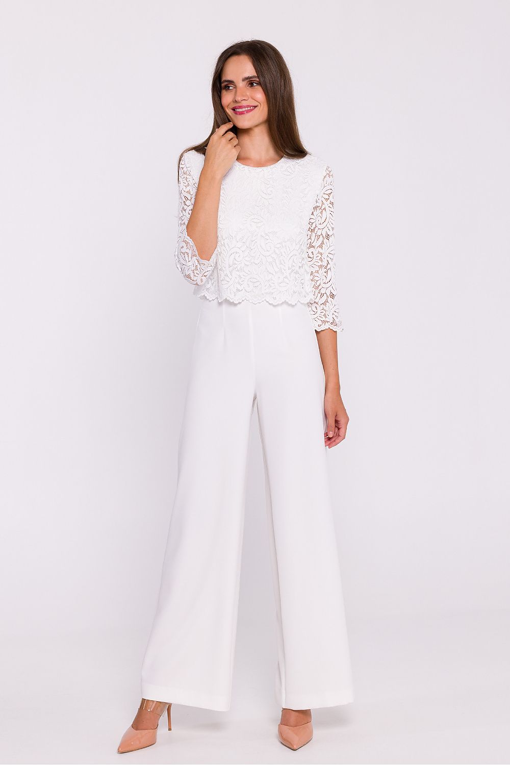 Stylove wide-leg jumpsuit on a serene backdrop, highlighting its refined elegance and perfect fit for special events.