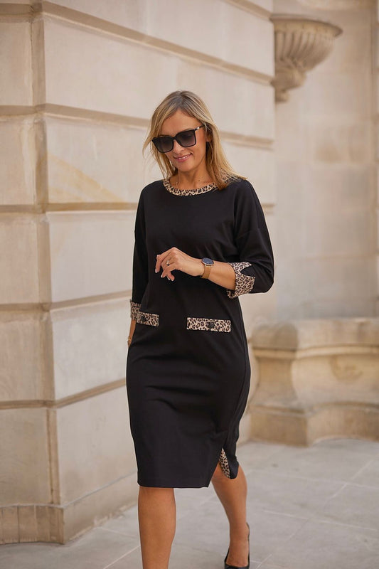 Elegant La Aurora kimono dress in leopard print, showcasing feminine design and plus size fit, perfect for sophisticated occasions.