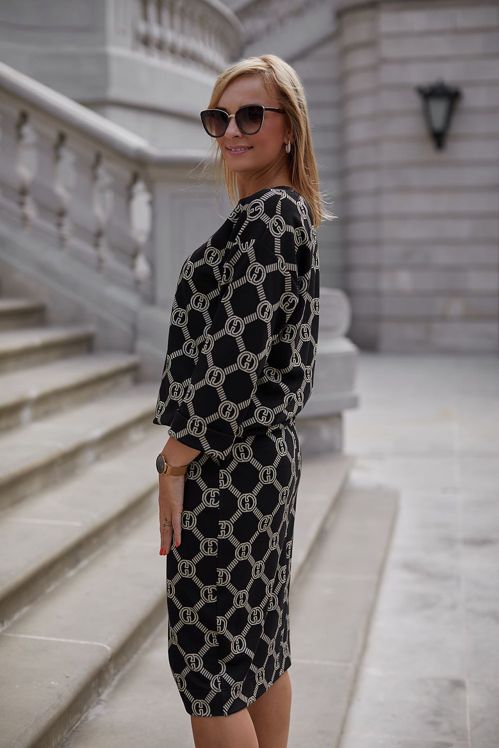 Luxury La Aurora Women's Set showcasing the adjustable kimono-sleeve blouse and knee-length skirt design, crafted from soft barnacle knit for ultimate comfort.