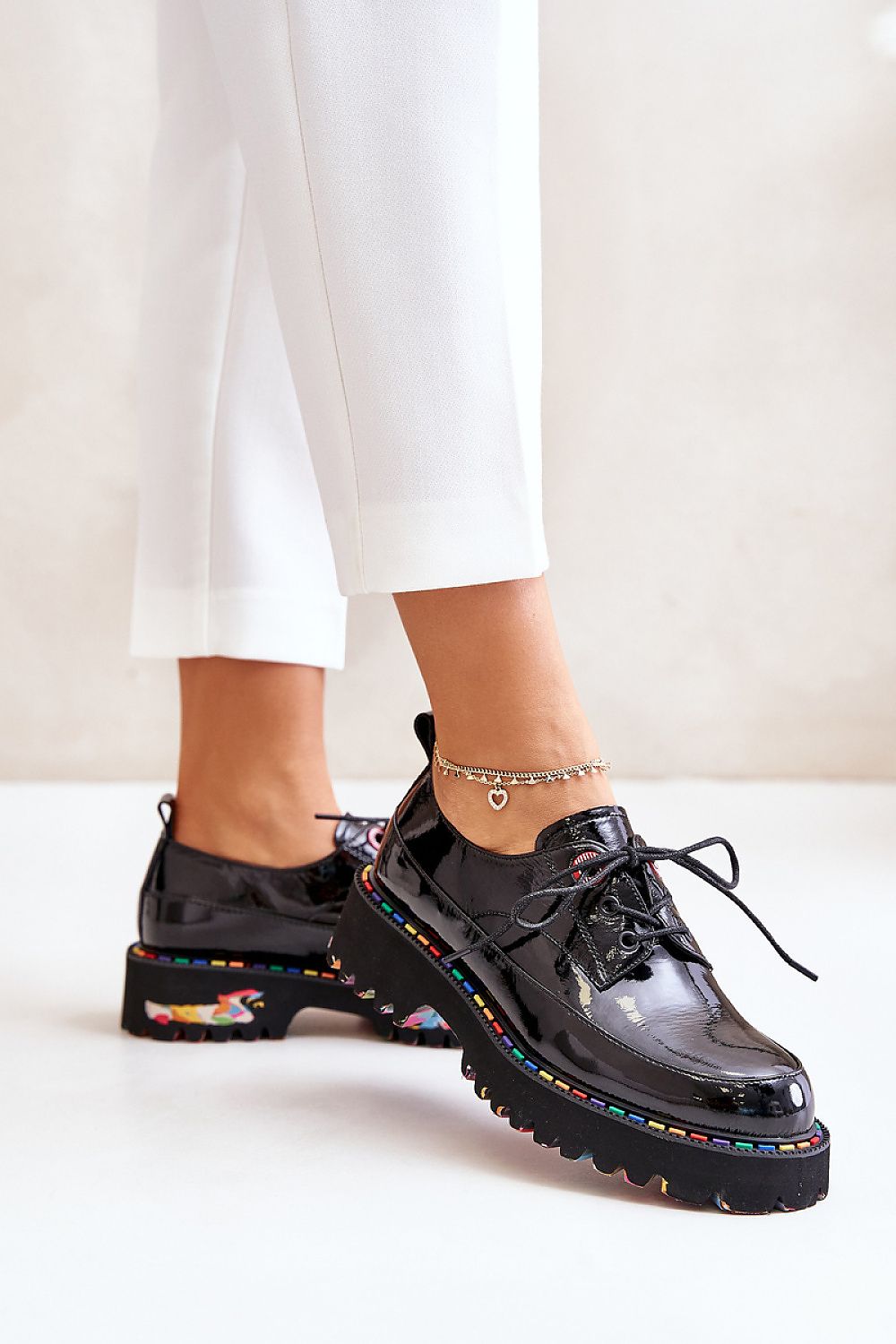 Elegant women's half shoes in natural leather by Step in Style. These luxurious shoes feature a flat heel for all-day comfort, a classic rounded toe, and a perfect lacing fit, designed to elevate your everyday outfits with a touch of sophistication.