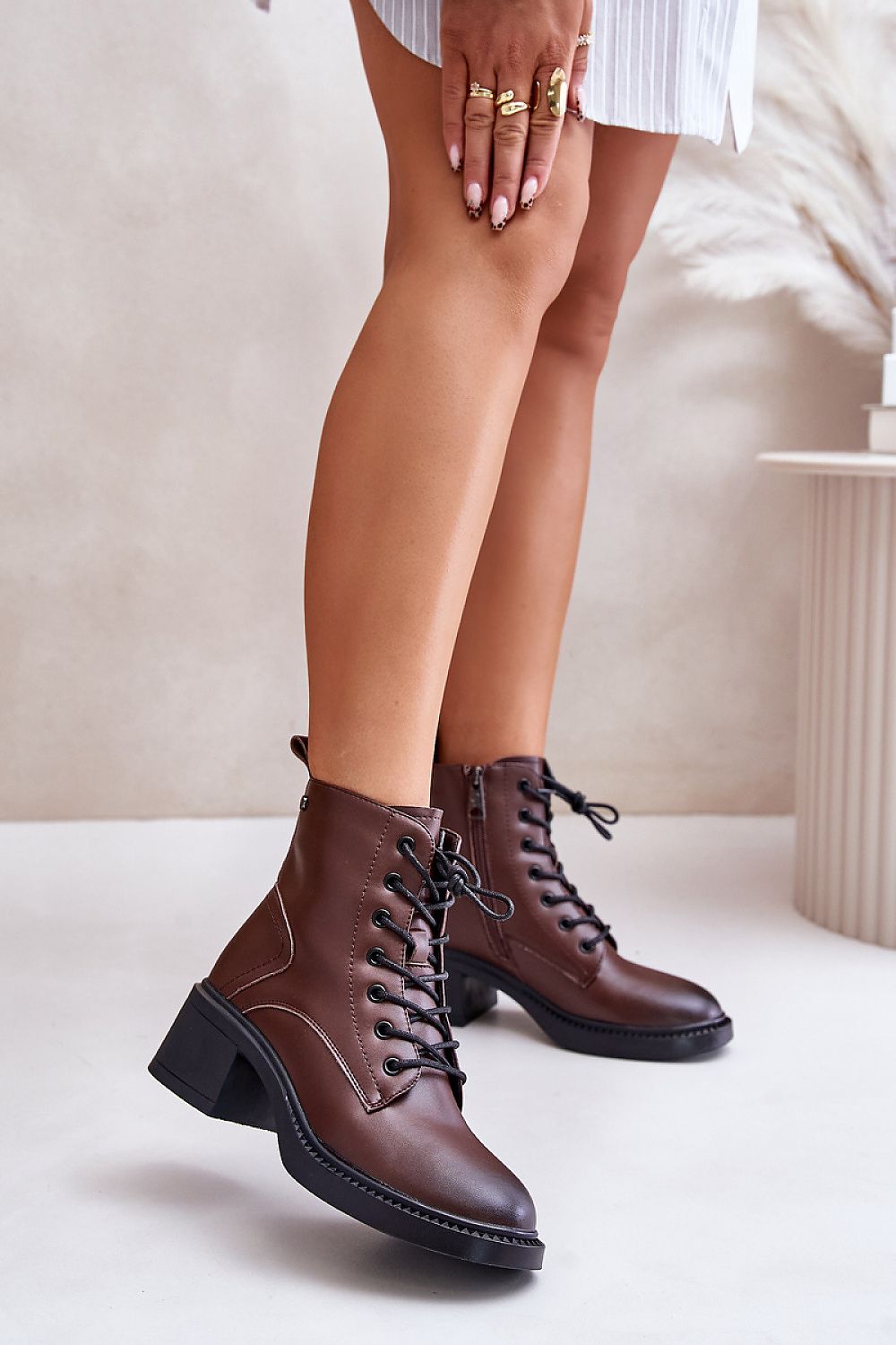 Vinceza Women's Natural Leather Low Heel Boots featuring elegant lacing and zipper closure, from the luxury brand Step in Style.