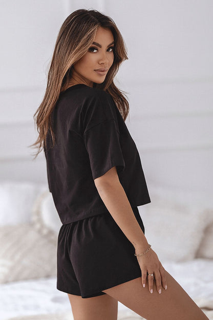 Stylish IVON Cotton Pyjama Set consisting of a loose t-shirt paired with practical shorts, crafted from premium cotton for an indulgent nightwear experience.