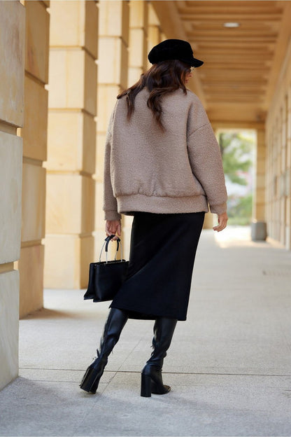 Ivon Quilted Sheepskin Jacket by Roco Fashion displayed on a hanger, highlighting its elegant shape and premium sheepskin material.