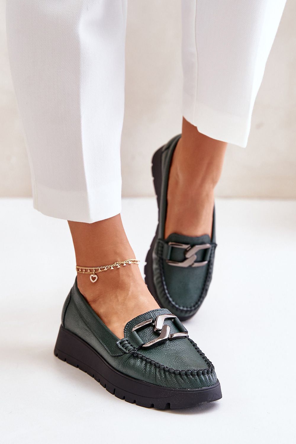 Stylish profile of women's natural leather moccasins by Step in style, highlighting the 3.5 cm heel height and refined design ideal for sophisticated looks.
