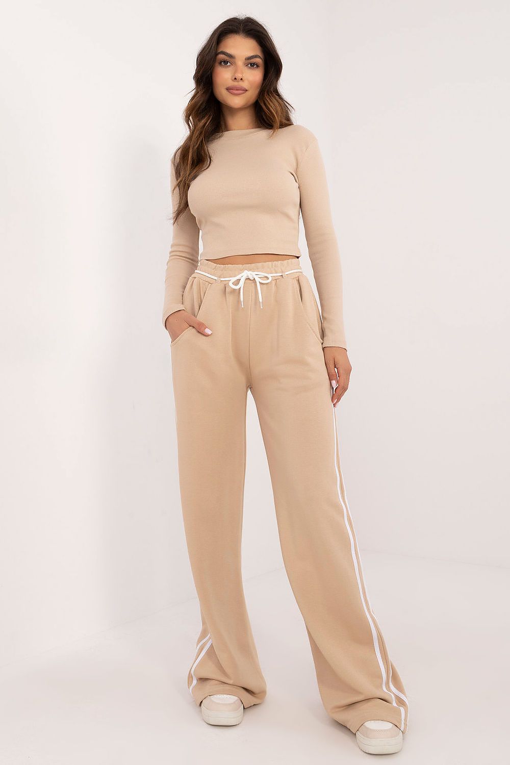 Stylish Women's Casual Sporty Set featuring a Long Sleeve Blouse and High-Waisted Trousers from Factory Price, highlighting modern comfort and elegant design for everyday sophistication.