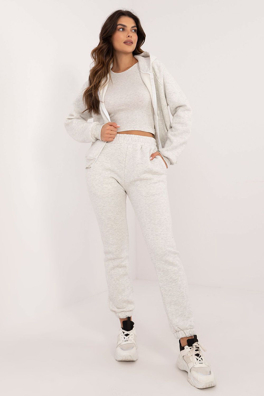 Luxurious women's casual sporty sweatshirt set by Factory Price, featuring a stylish cotton blend T-shirt, a zippered hooded sweatshirt, and high-rise trousers in a chic melange pattern.