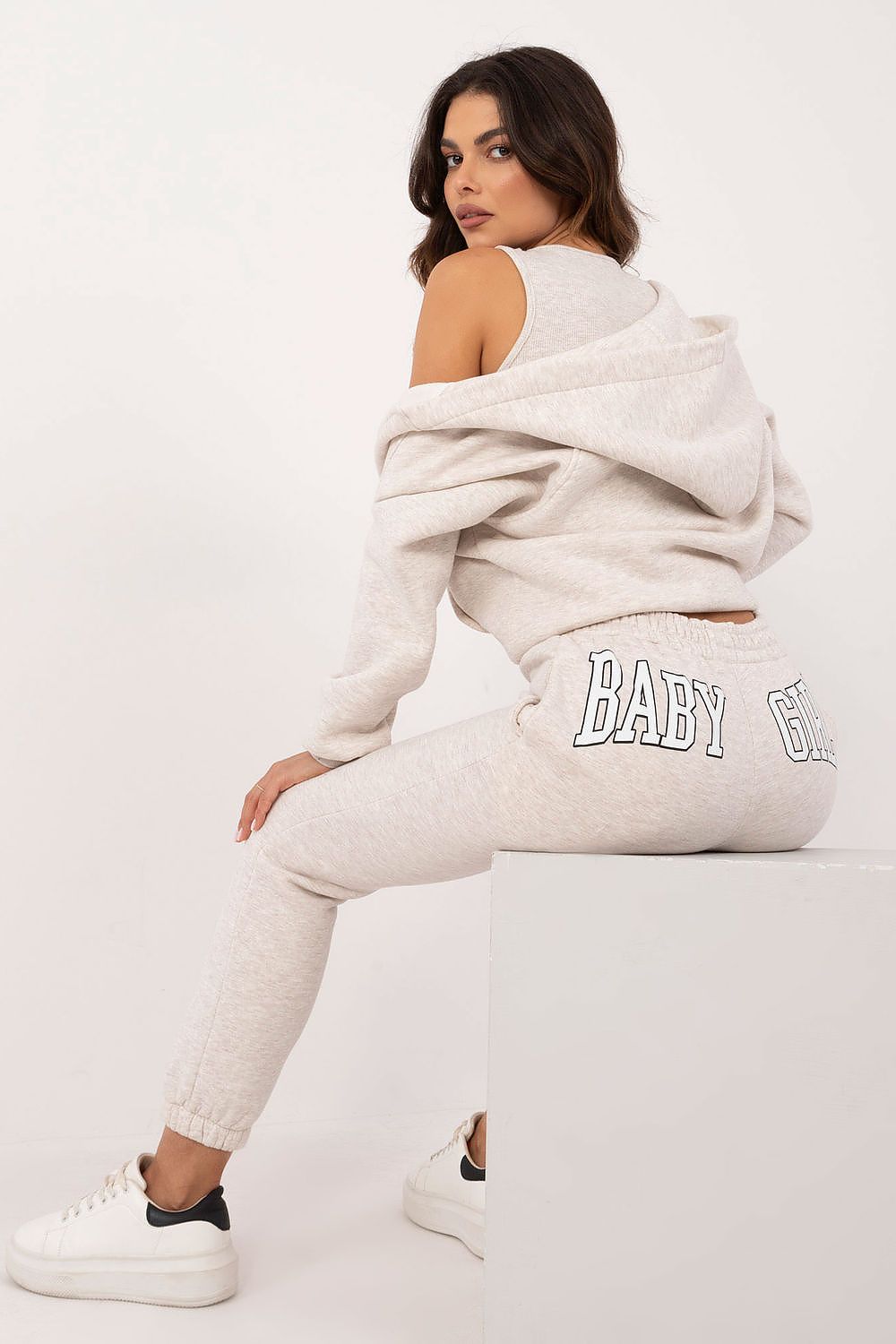 Luxurious zippered hooded sweatshirt from the Women's Casual Sporty Sweatshirt Set by Factory Price, crafted with a comfortable cotton blend for fashionable warmth.