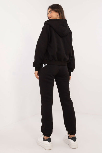 Complete view of the Women's Casual Sporty Sweatshirt Set from Factory Price, ideal for sophisticated casual wear, emphasizing the combination of a stylish T-shirt, sweatshirt, and trousers.
