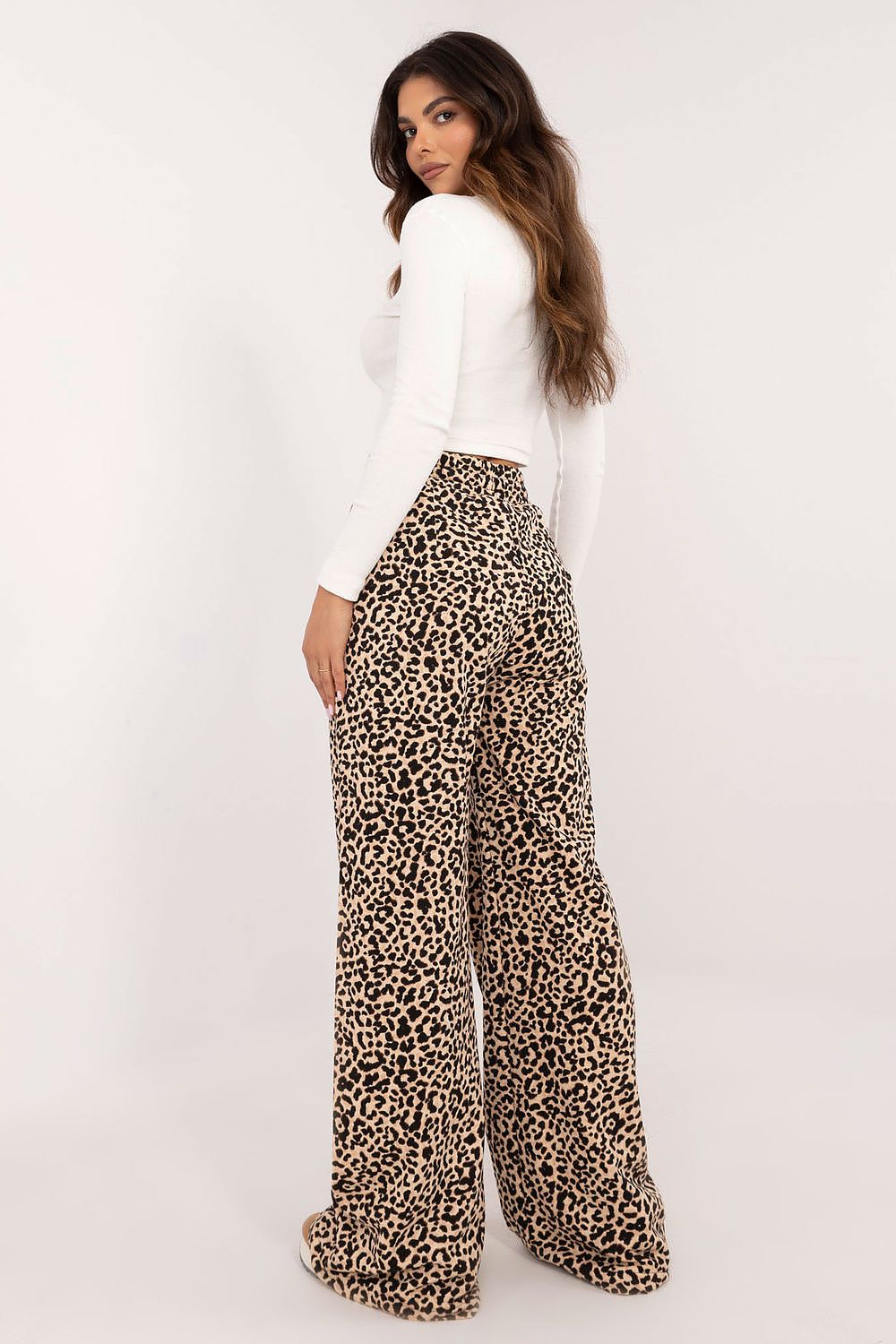 Luxurious Women's Casual Set by Factory Price featuring a ribbed blouse and elegant wide-leg trousers adorned with a striking animal motif, crafted from a comfortable cotton blend.