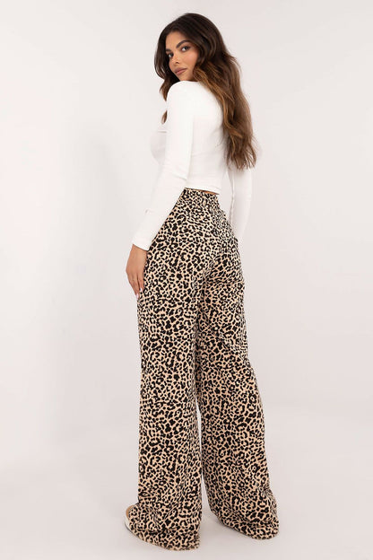 Luxurious Women's Casual Set by Factory Price featuring a ribbed blouse and elegant wide-leg trousers adorned with a striking animal motif, crafted from a comfortable cotton blend.