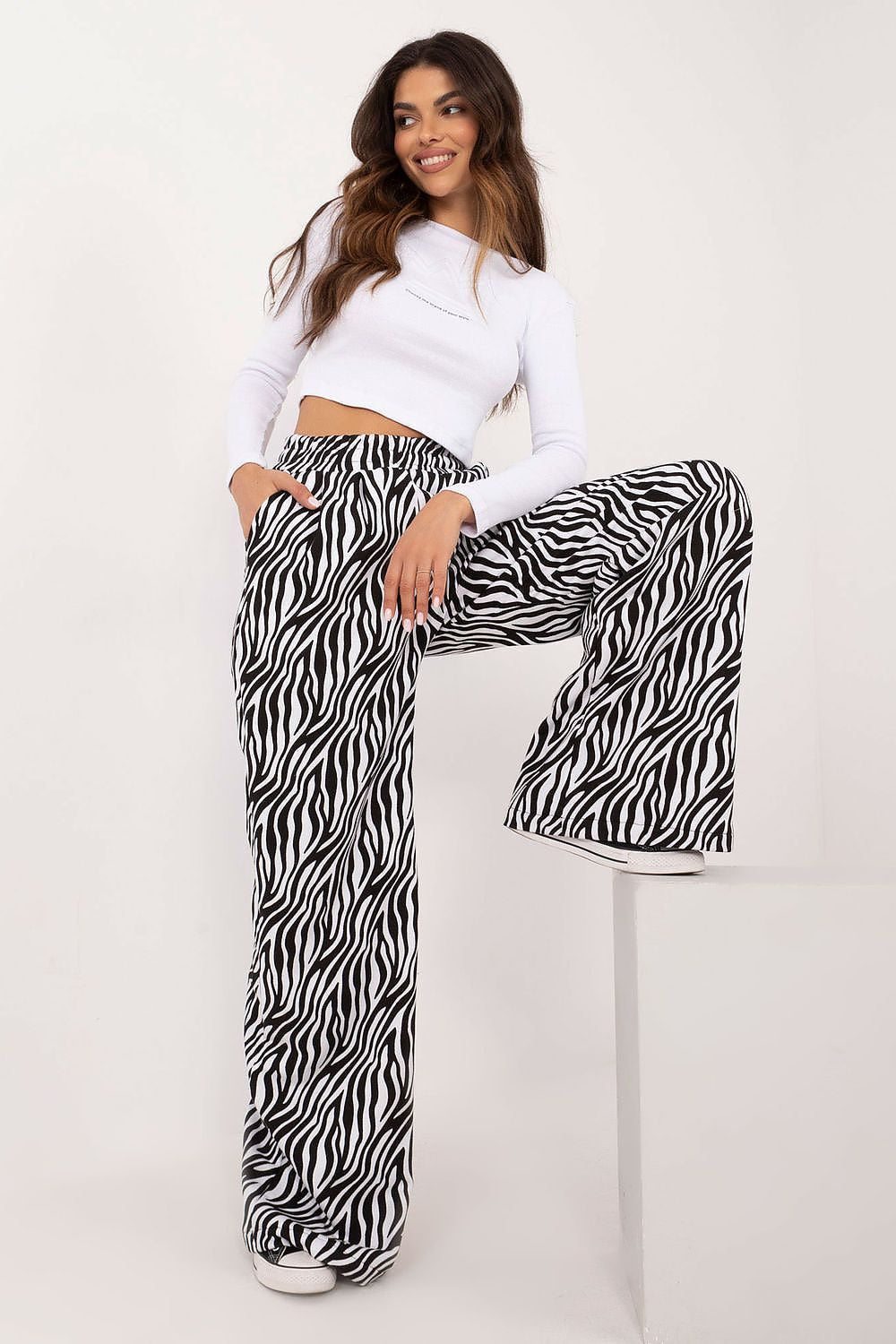 Elegant wide-leg trousers with an eye-catching animal motif from Factory Price's Women's Casual Set, designed for ultimate comfort and sophistication.