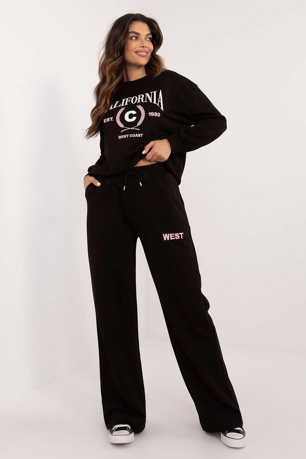 Elegant women's casual cotton set featuring a long-sleeved blouse and high-waisted pants with original prints, designed by Factory Price for luxurious everyday wear.
