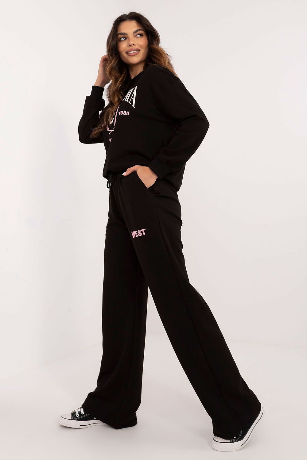 Complete women's casual cotton outfit, including long-sleeves and high-waisted pants, exemplifying a perfect blend of comfort and style by Factory Price.