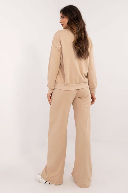 High-waisted pants from Factory Price's women's casual cotton set, designed with original prints and practical side pockets for a chic yet functional look.