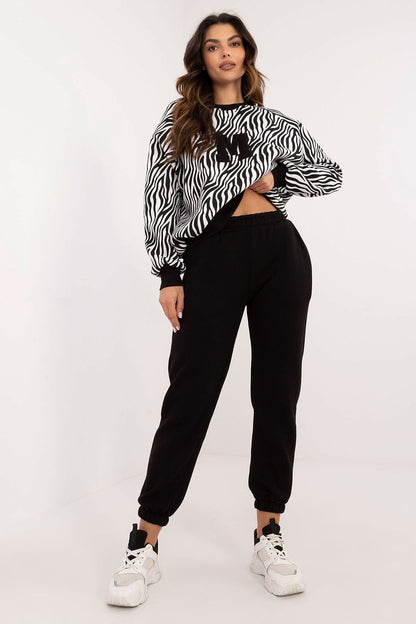 Fashionable animal print sweatshirt perfect for everyday wear, showcasing luxury comfort in this women's set by Factory Price.