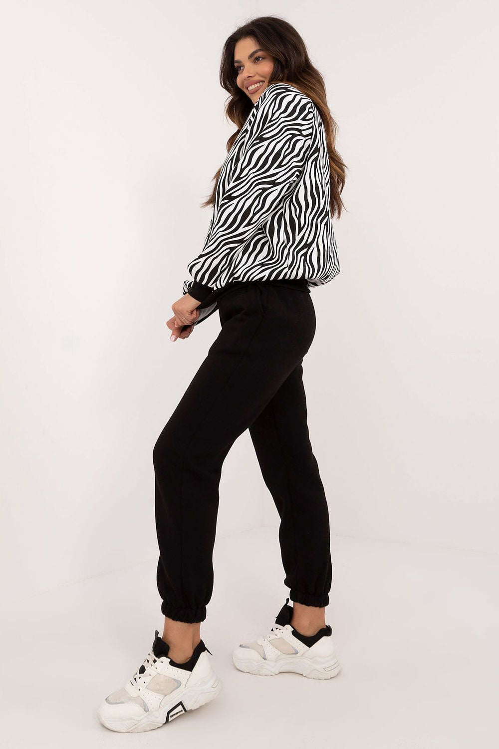 Elegant women's stylish casual set featuring an animal print sweatshirt, long sleeve blouse, and high waist trousers by Factory Price, perfect for fashionable everyday wear.