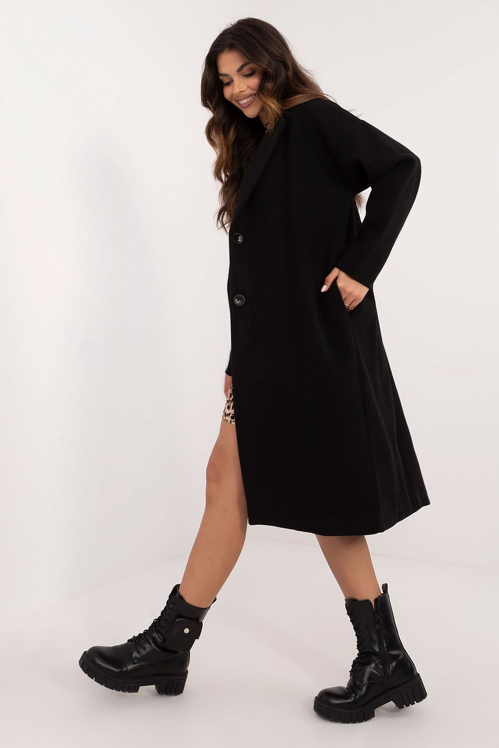 Elegant Och Bella women's coat in an outdoor setting, emphasising its contemporary cut, warmth, and versatility for both everyday chic and formal wear.
