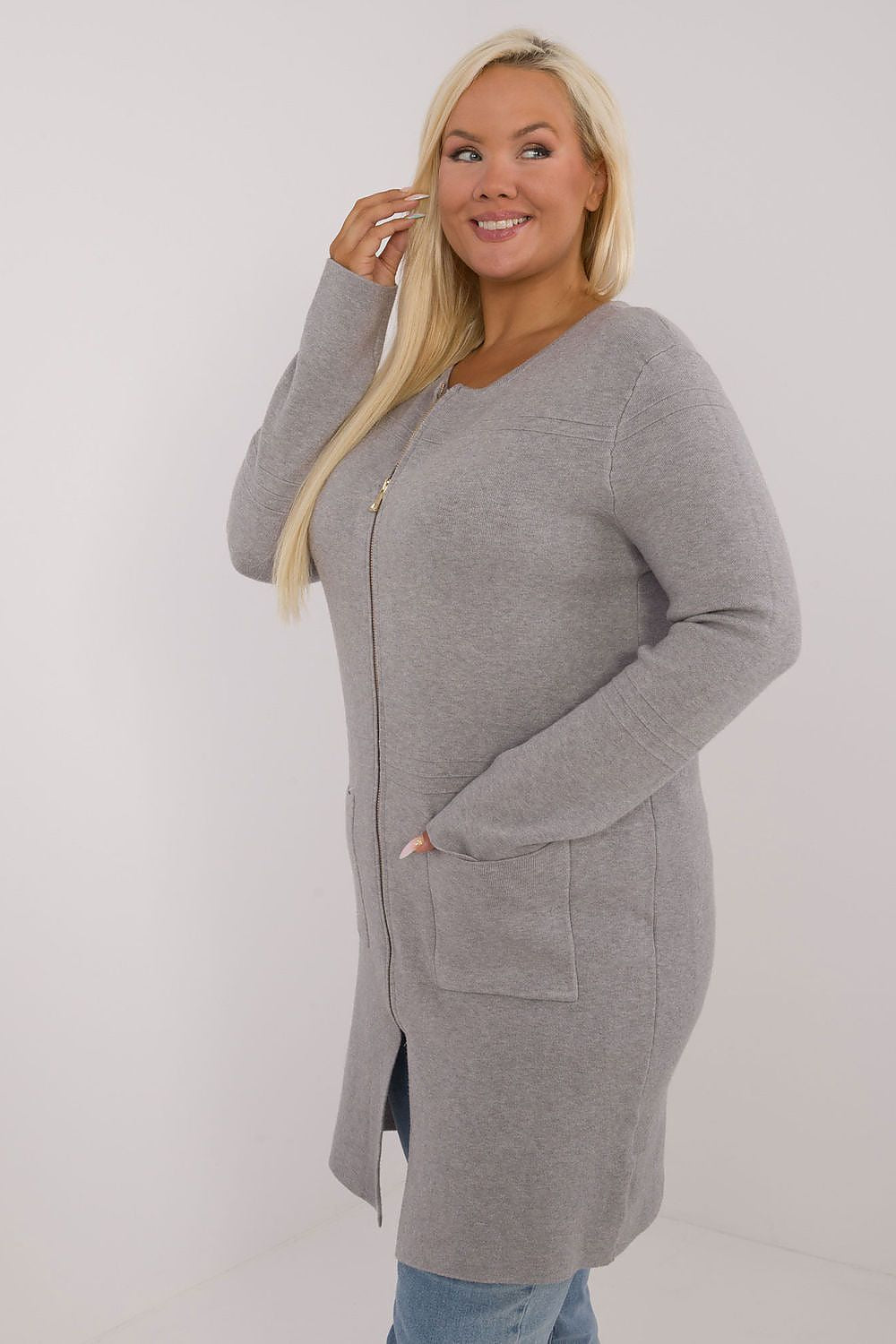 Model wearing the Factory Price Plus Size Women's Zipper Sweater, demonstrating its oversized fit and stylish appearance, ideal for any occasion.
