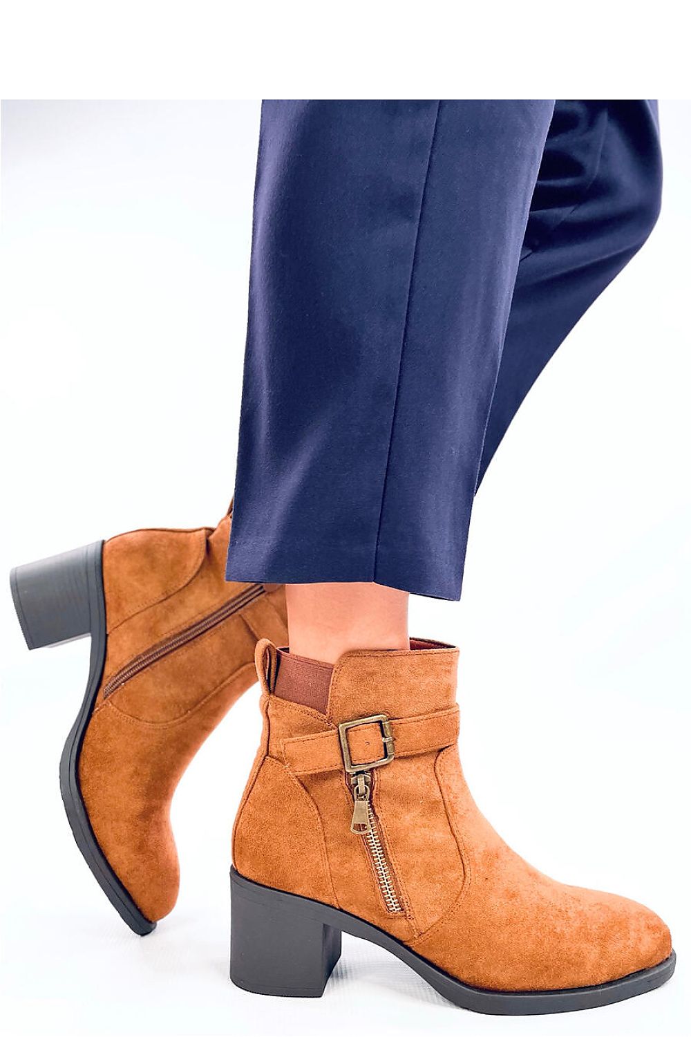 Fashion-forward Inello women's eco-suede boots with a 6cm heel, blending sustainability with luxury in a timeless style.