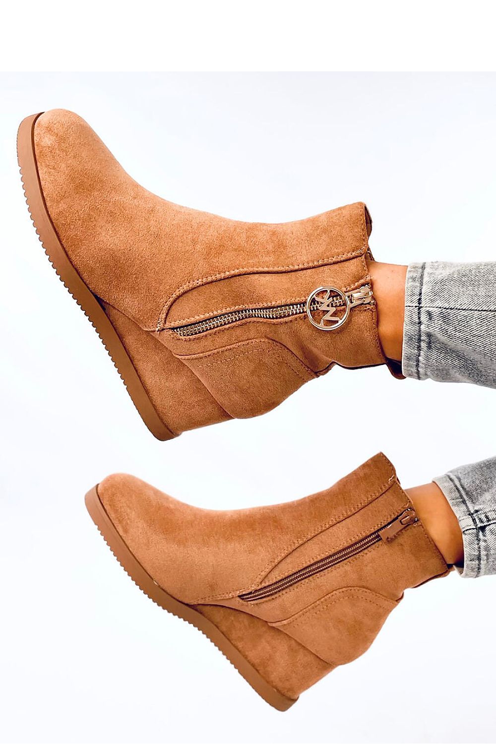 Stylish women's eco-suede buskin boots with a gold zipper and 6 cm heel, featuring soft fur lining, designed by Inello.