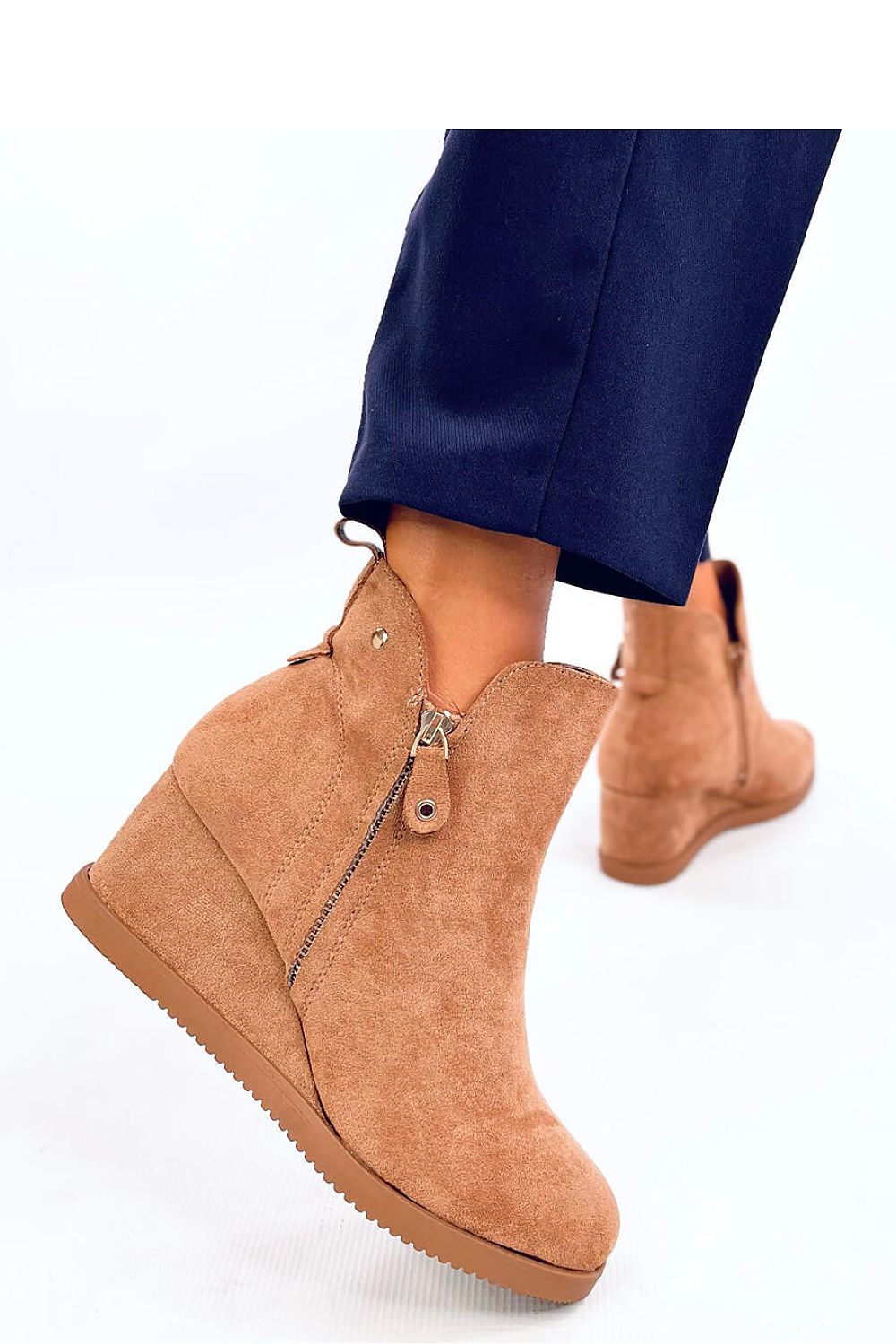 Elegant women's eco-suede buskin boots by Inello, featuring a 6 cm heel and soft fur lining, perfect for stylish everyday wear.