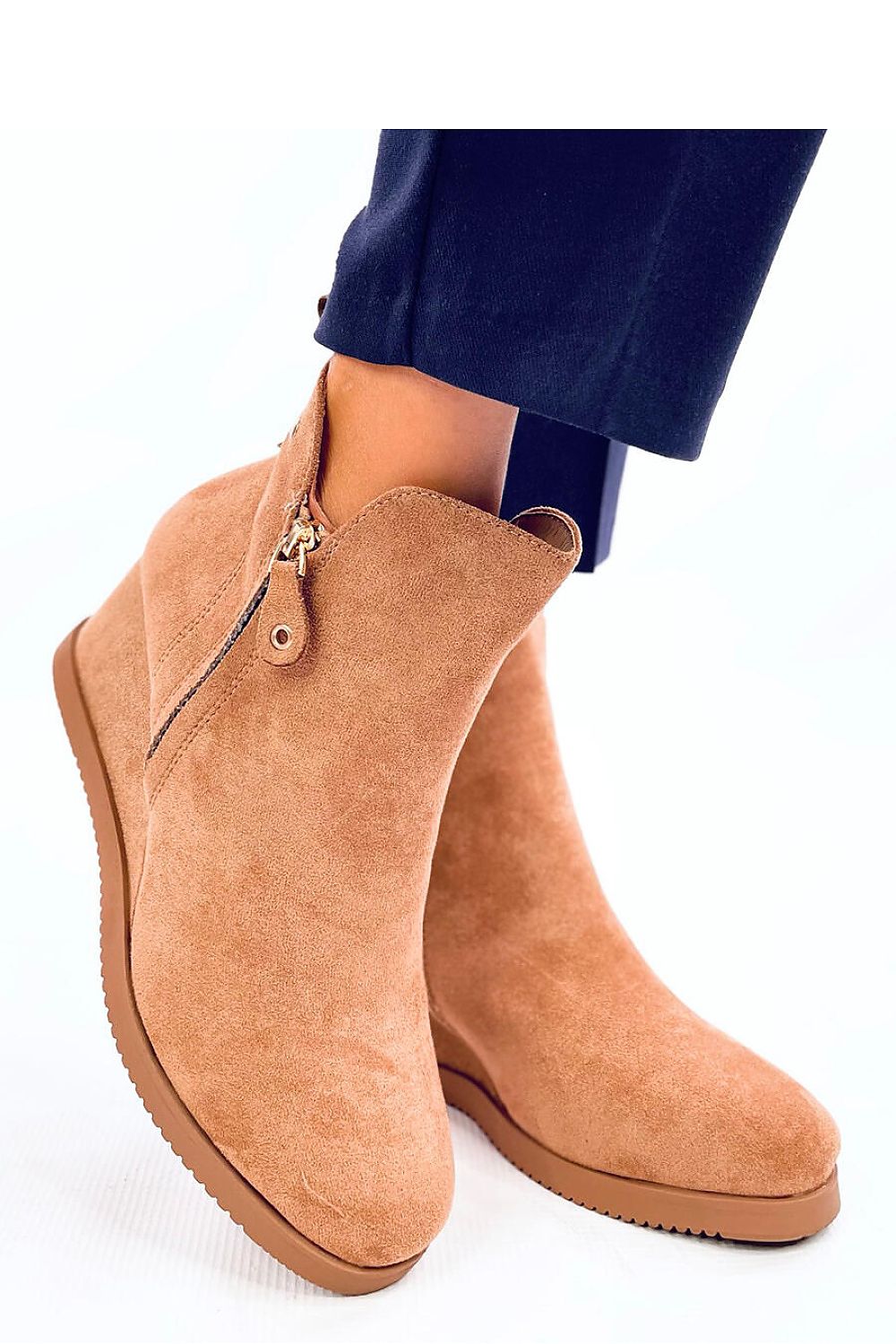 Elegant Women's eco-suede buskin boots with a 6 cm heel and soft fur lining by Inello, showcasing classic cut and decorative zipper design for luxury footwear.